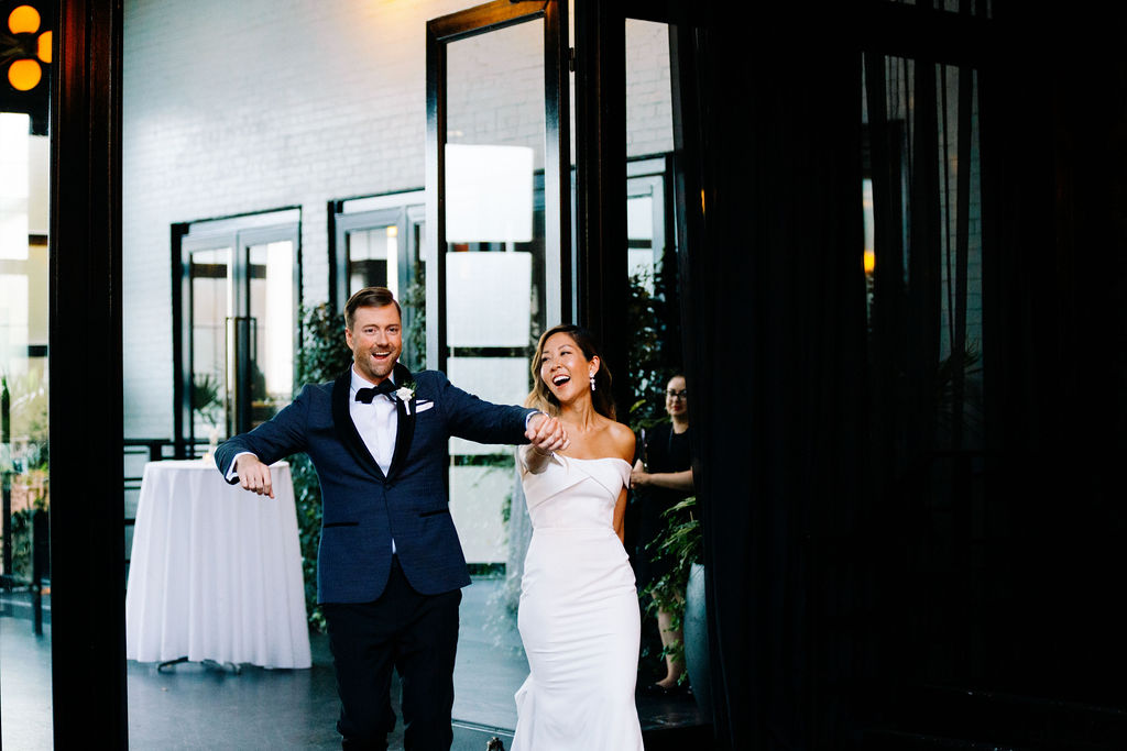 Couple making their grand entrance into reception area at 501 Union