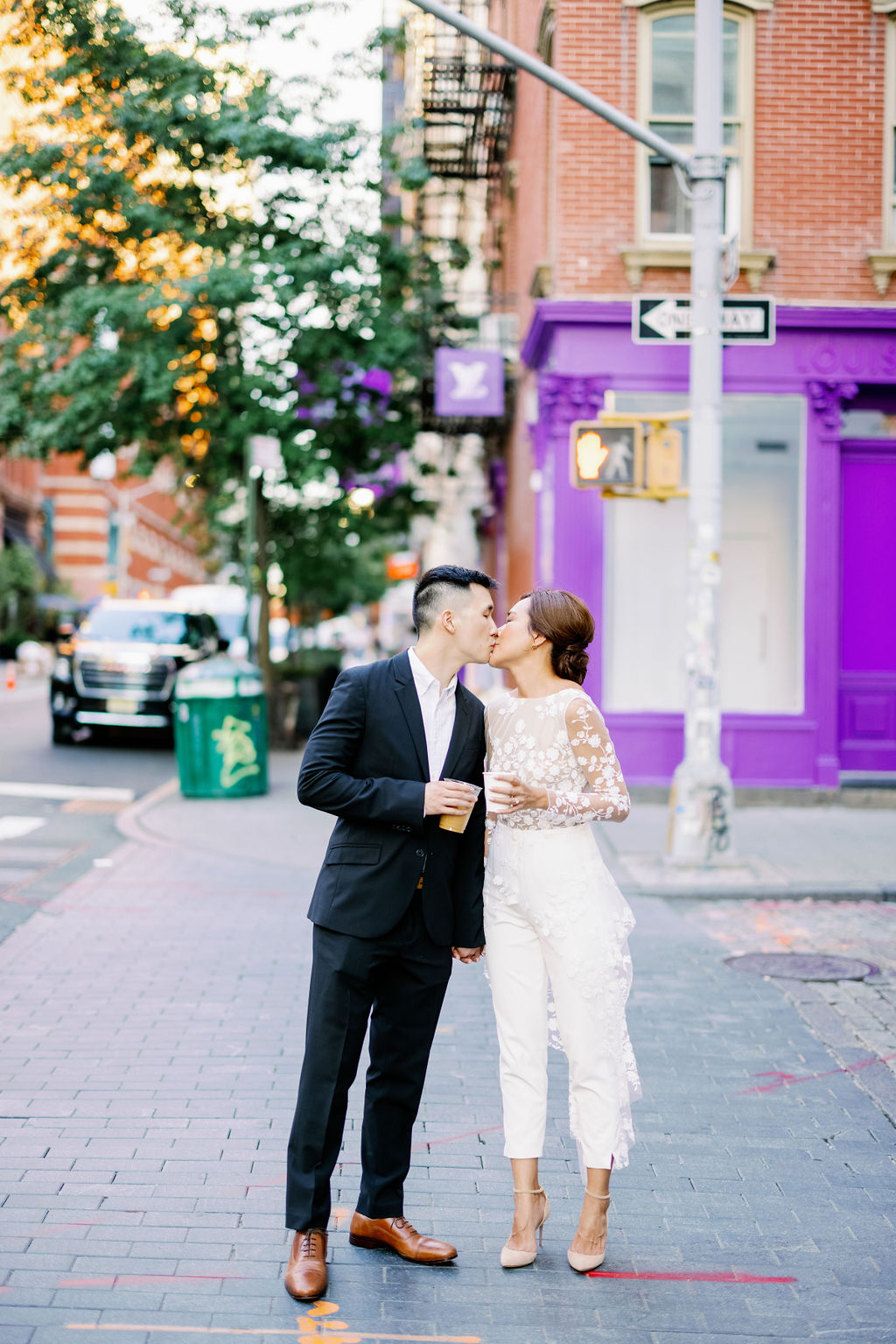 Couple kissing at SOHO NYC